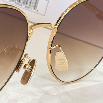 Gucci Sunglasses — 9