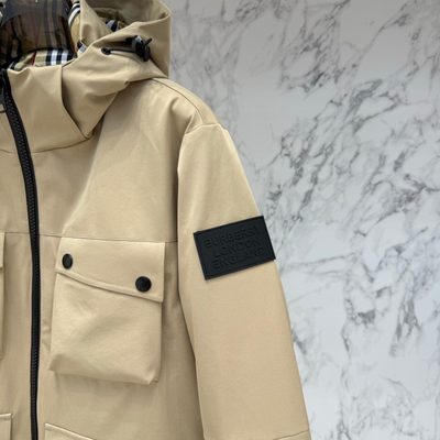 Burberry hooded utility jacket with four front patch pockets — 6