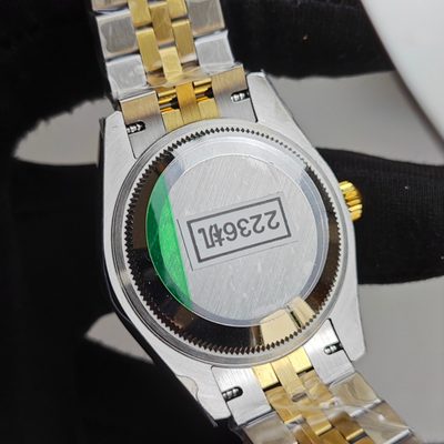 Rolex Watch — 9