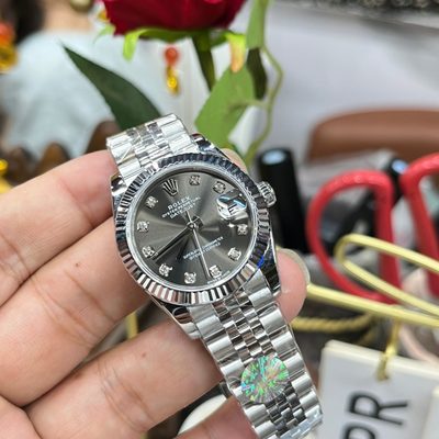 Rolex Watch — 9