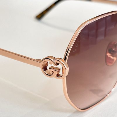 Gucci Sunglasses — 9