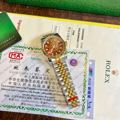Rolex Watch — 9
