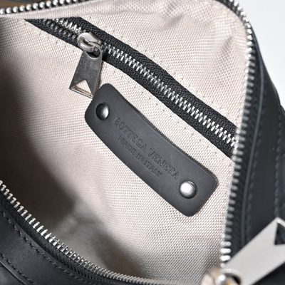 Bottega Veneta-style black woven Intrecciato leather pillow bag — 8