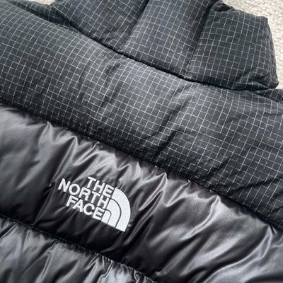 The North Face black cropped puffer jacket — 10