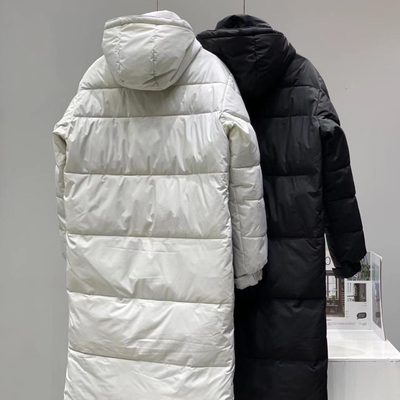 The North Face long, oversized padded puffer coat with a hood — 10