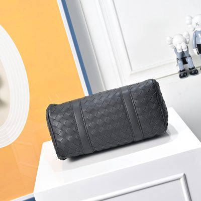 Bottega Veneta-style black woven Intrecciato leather pillow bag — 5