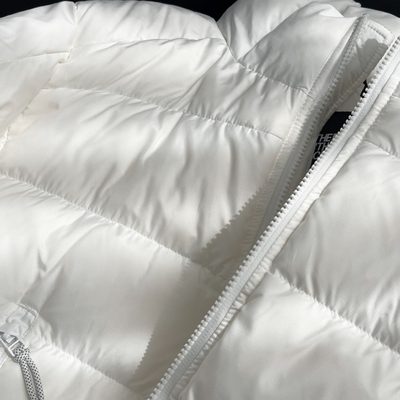 The North Face white cropped puffer jacket — 6