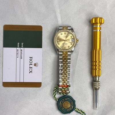 Rolex Watch — 9