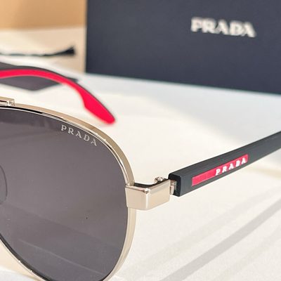 Prada Sunglasses — 9