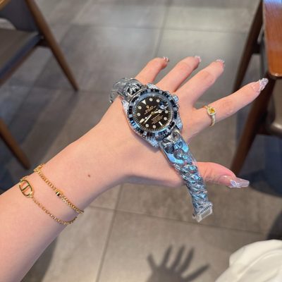 Rolex Watch — 7