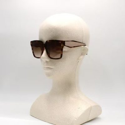 Prada Sunglasses — 8