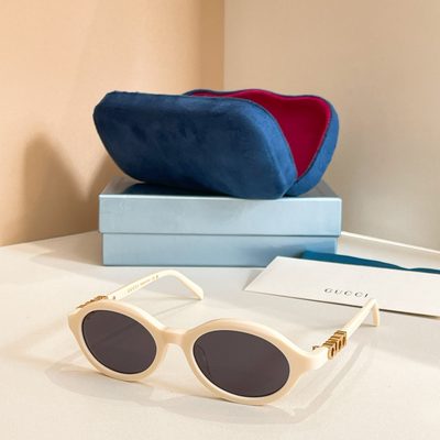 Gucci Sunglasses — 9