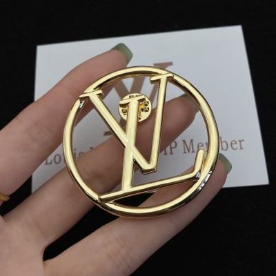 Louis Vuitton LV initials logo inside a circle — 3