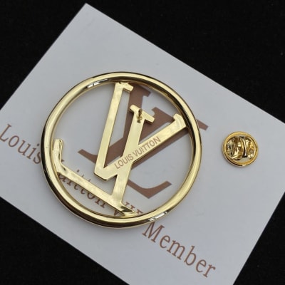Louis Vuitton LV initials logo inside a circle — 6