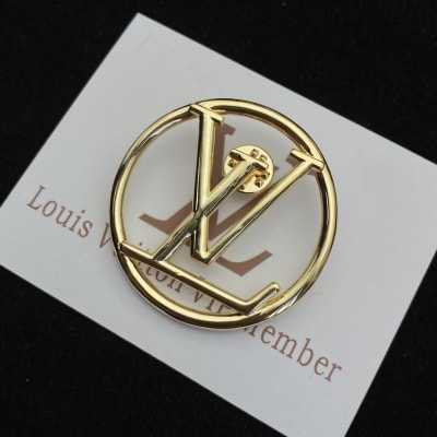 Louis Vuitton LV initials logo inside a circle